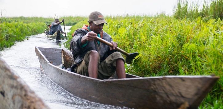 Fishermen In Mabamba Swamp